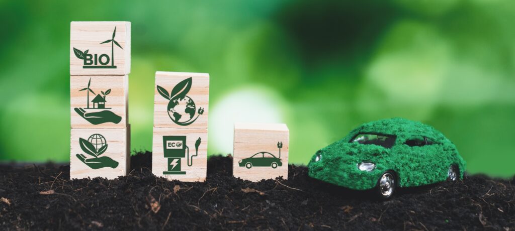 Green biofuel car model for eco-friendly clean energy engine vehicle with zero CO2 emission symbolizing environmental concern and forest regeneration for sustainable future. Alter