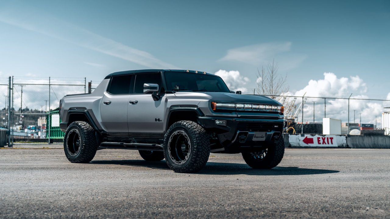 2023 Hummer EV parked at an angle with blue skies overhead