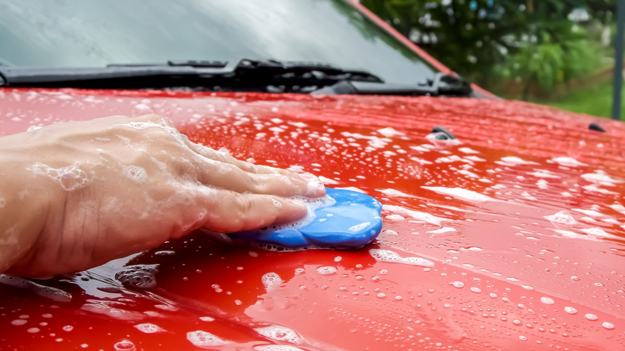 Using Clay bar to cleaning the car surface.