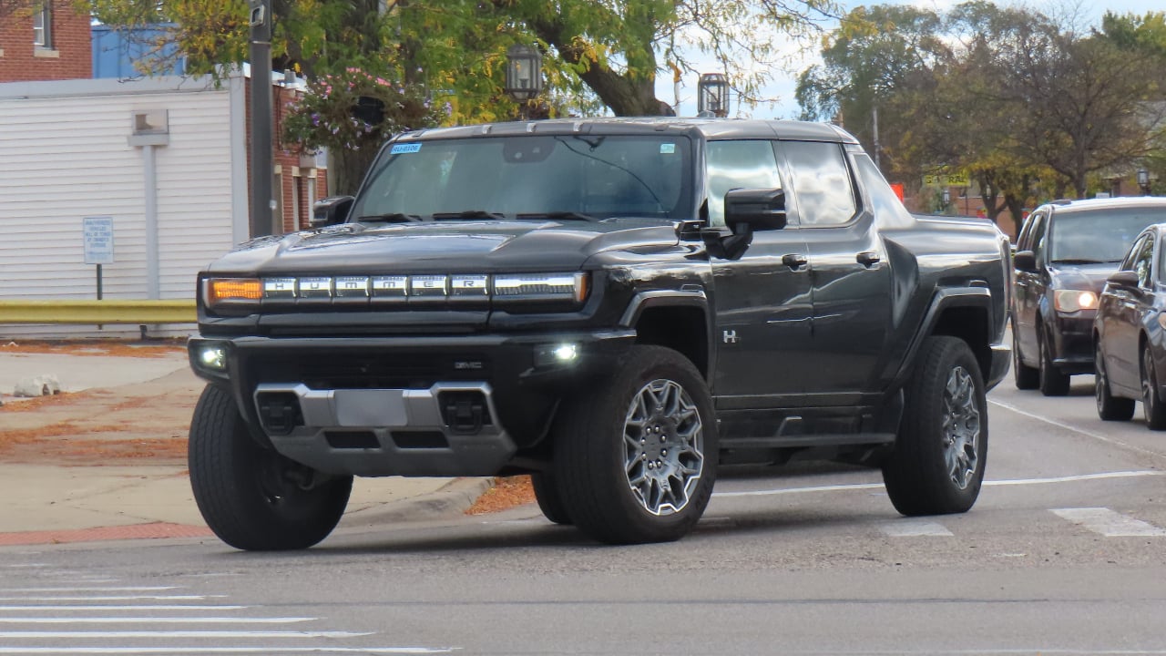 A 2022 GMC Hummer EV Truck in Void Black, seen in Eastpointe, Michigan.