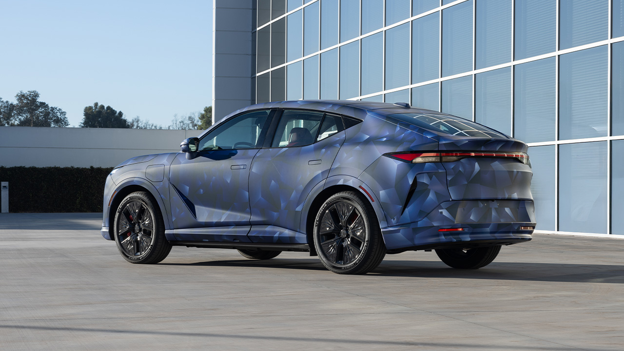 The new Acura RSX prototype in camouflage, rear 3/4 view