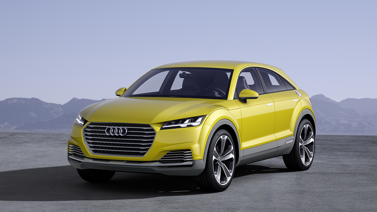 The Audi TT Offroad Concept in yellow, front 3/4 view