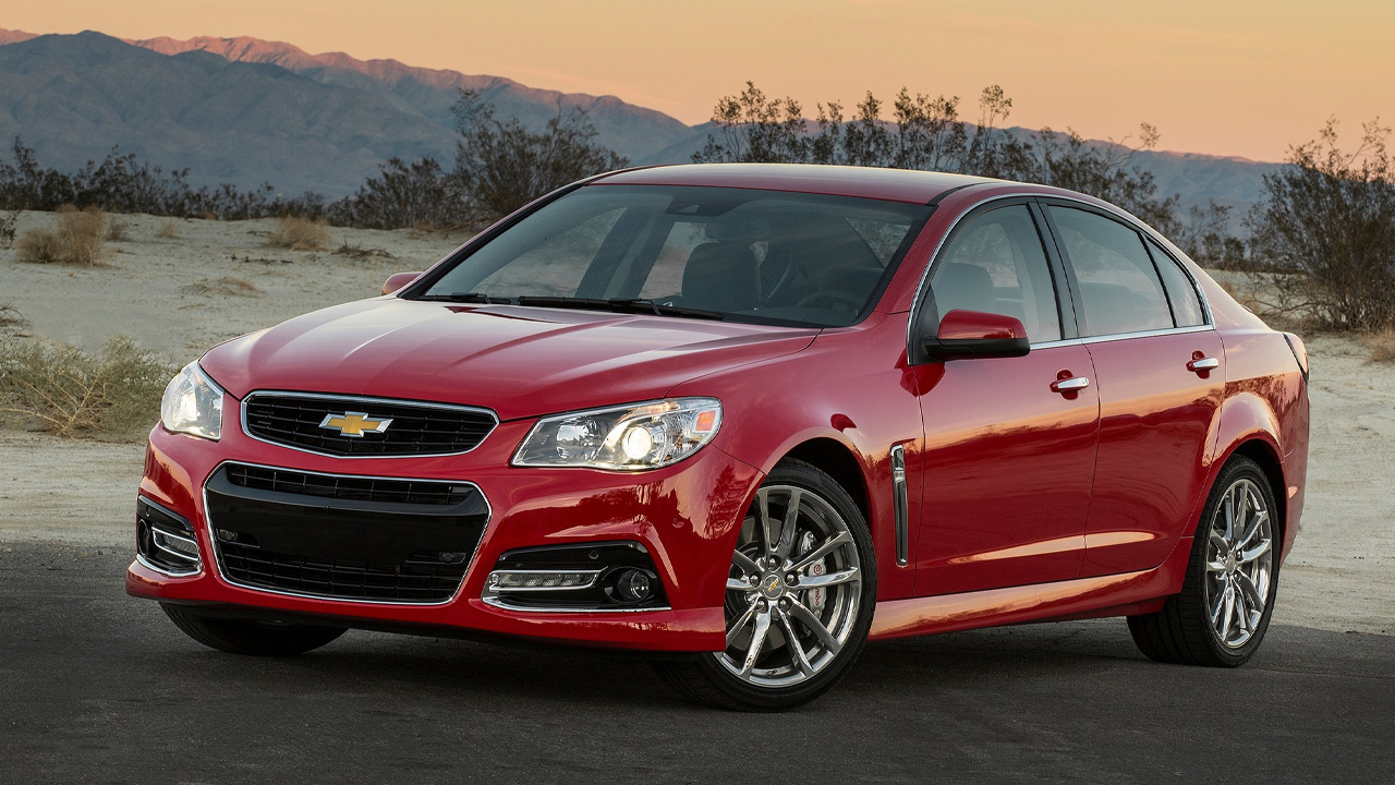 The Chevrolet SS in red, sunset setting, front 3/4 view