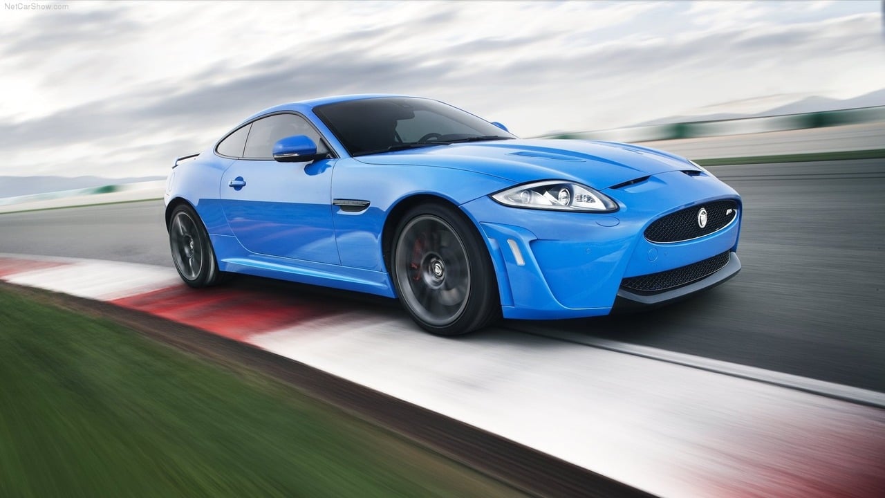 French Racing Blue 2012 Jaguar XKR-S Driving On Track Front 3/4 View