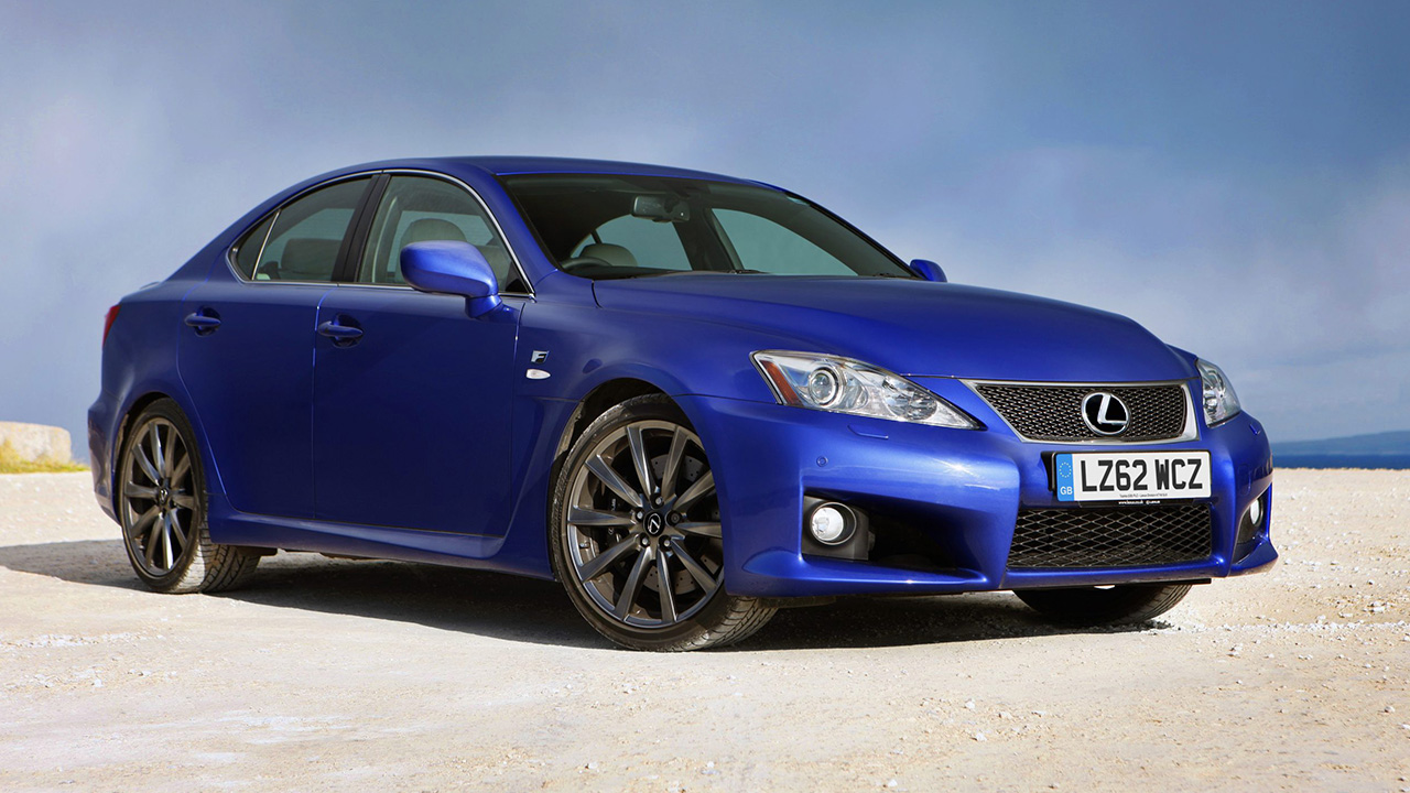 A Lexus IS F in Ultrasonic Blue Mica in the desert, front 3/4 view