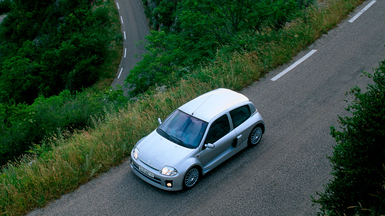 Silver Renault Clio V6 Parked In The Mountain Roads