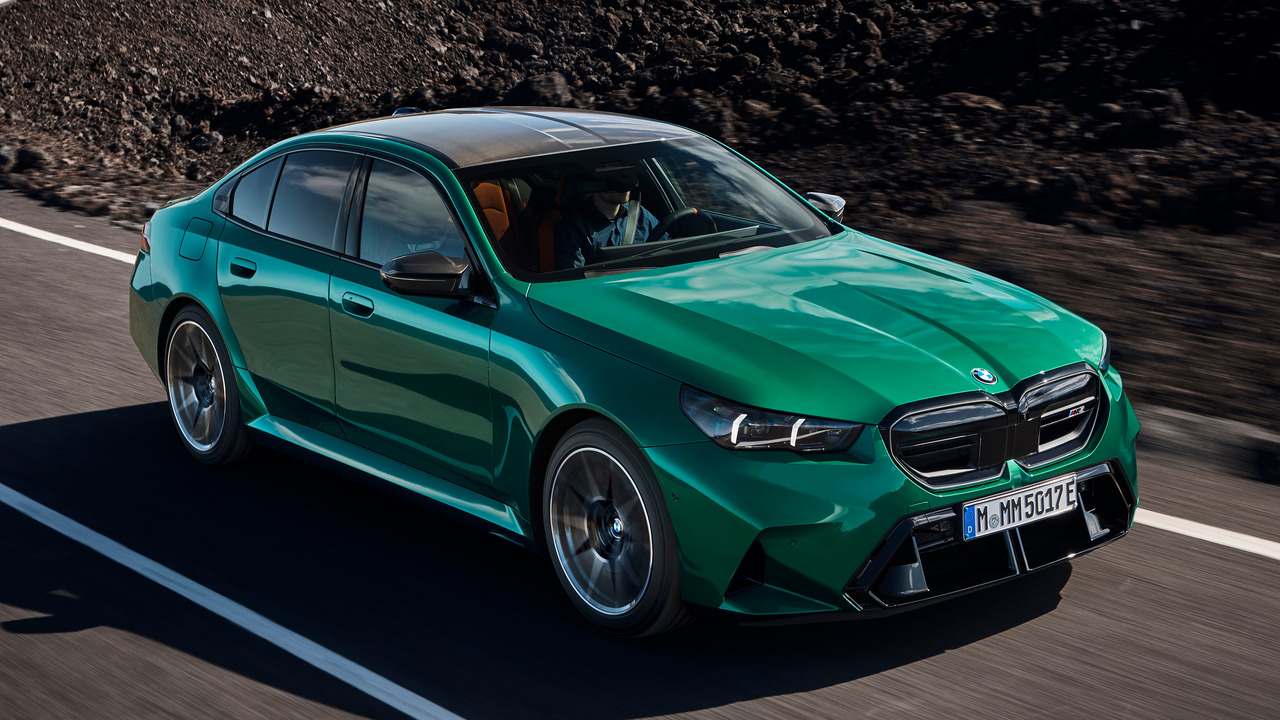 Isle Of Man Green 2025 BMW M5 Sedan Driving On The Road