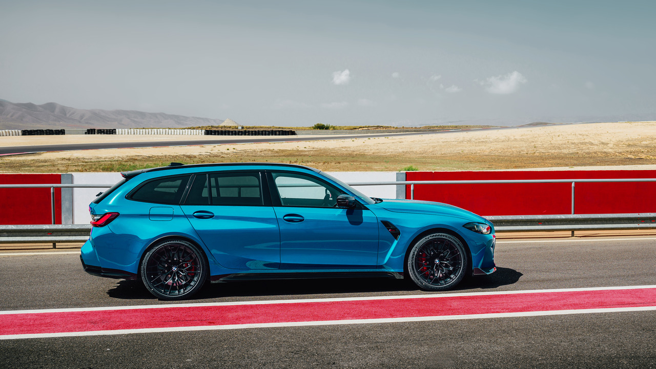 Laguna Seca Blue 2025 BMW M3 CS Touring Parked On Track Side Profile