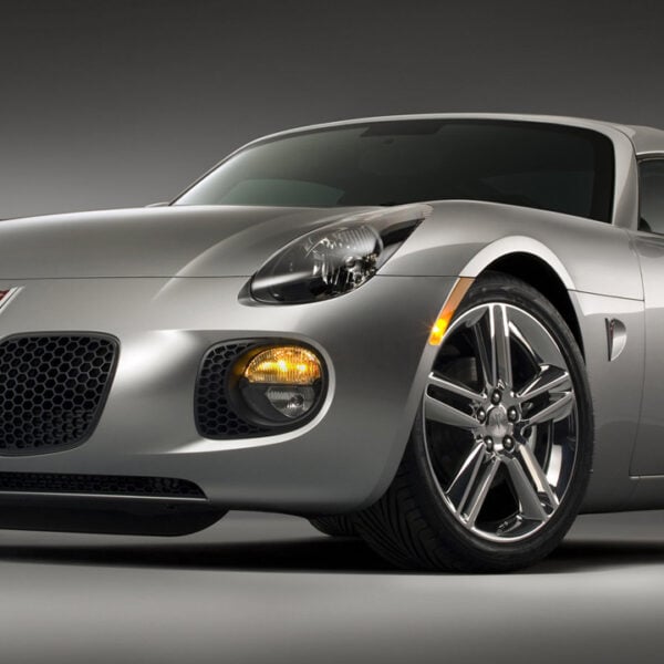 The Pontiac Solstice GXP Coupe in silver, studio shot, front 3/4 view