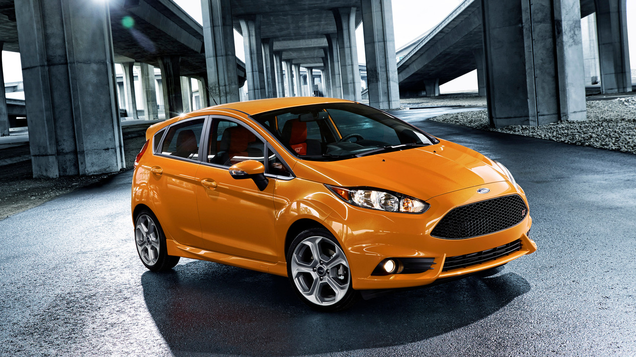 Yellow-Orange 2017 Ford Fiesta ST Parked Front 3/4 View