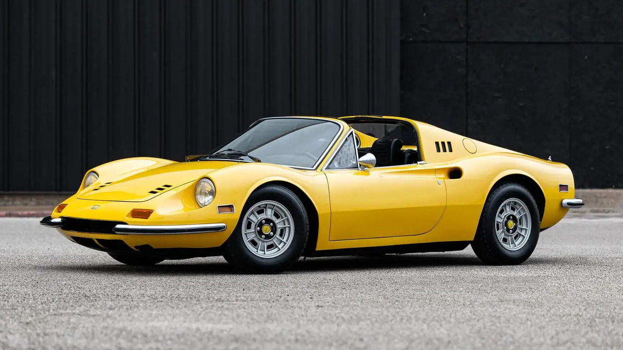 Yellow 1972 Ferrari Dino 246 GTS Parked With Roof Down Front 3/4 View