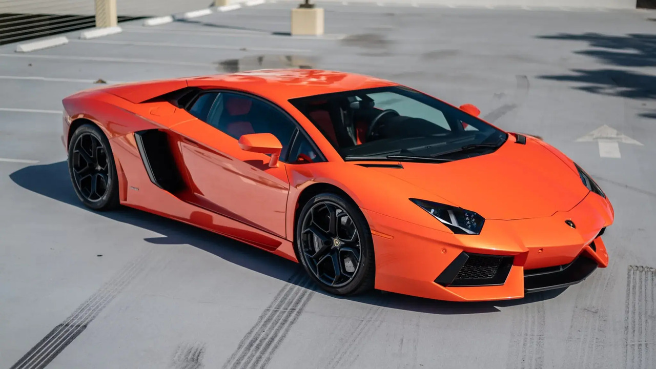 Orange 2012 Lamborghini Aventador Coupe Parked Front 3/4 View