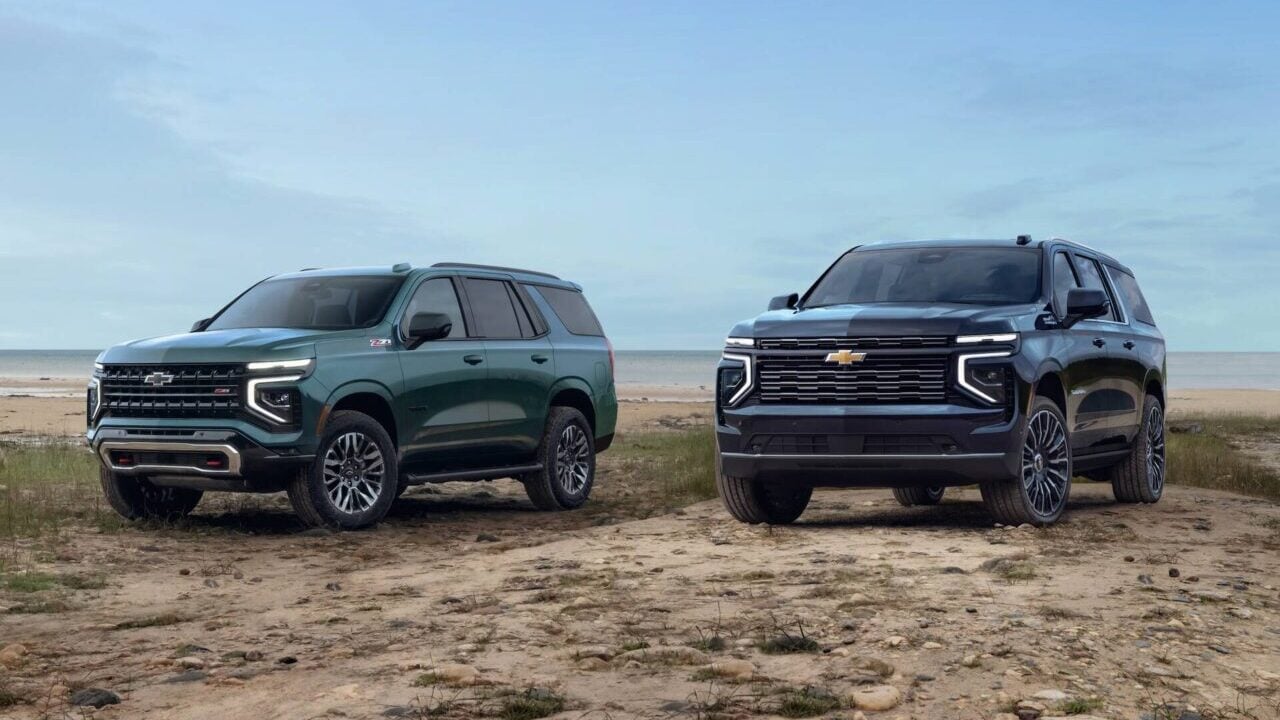 Chevy Tahoe and Suburban in desert.