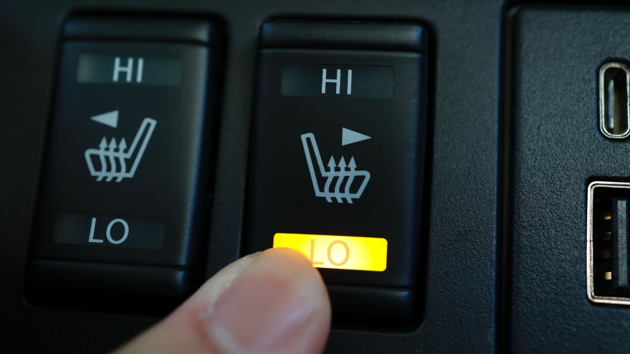 A switch to activate heated seats in car seats