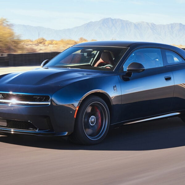 The new Dodge Charger Daytona EV on the race track, front 3/4 view
