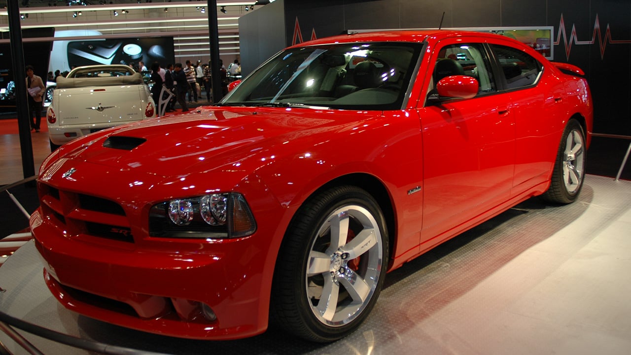A red Dodge Charger SRT8 at the 2007 Tokyo Motor Show, front 3/4 view