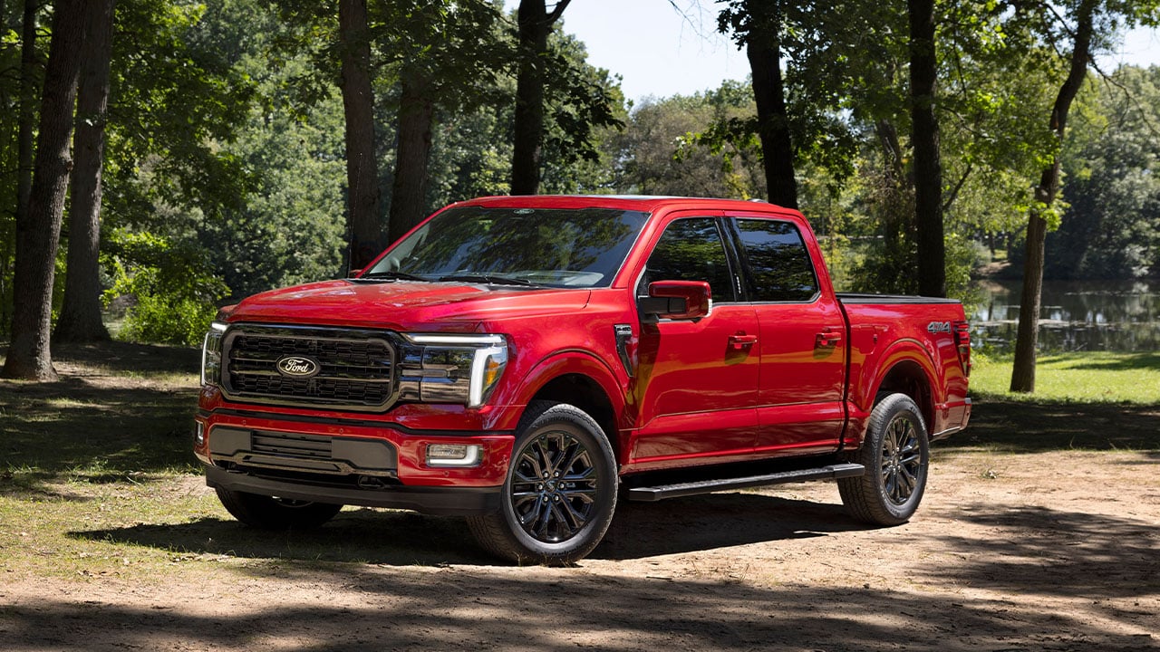 The facelifted Ford F-150 Lariat in red, front 3/4 view