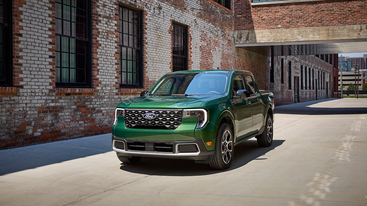 A green 2025 Ford Maverick Lariat, front 3/4 view