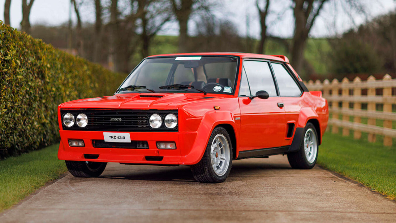 Red 1976 Fiat 131 Abarth Rally Parked Front 3/4 View