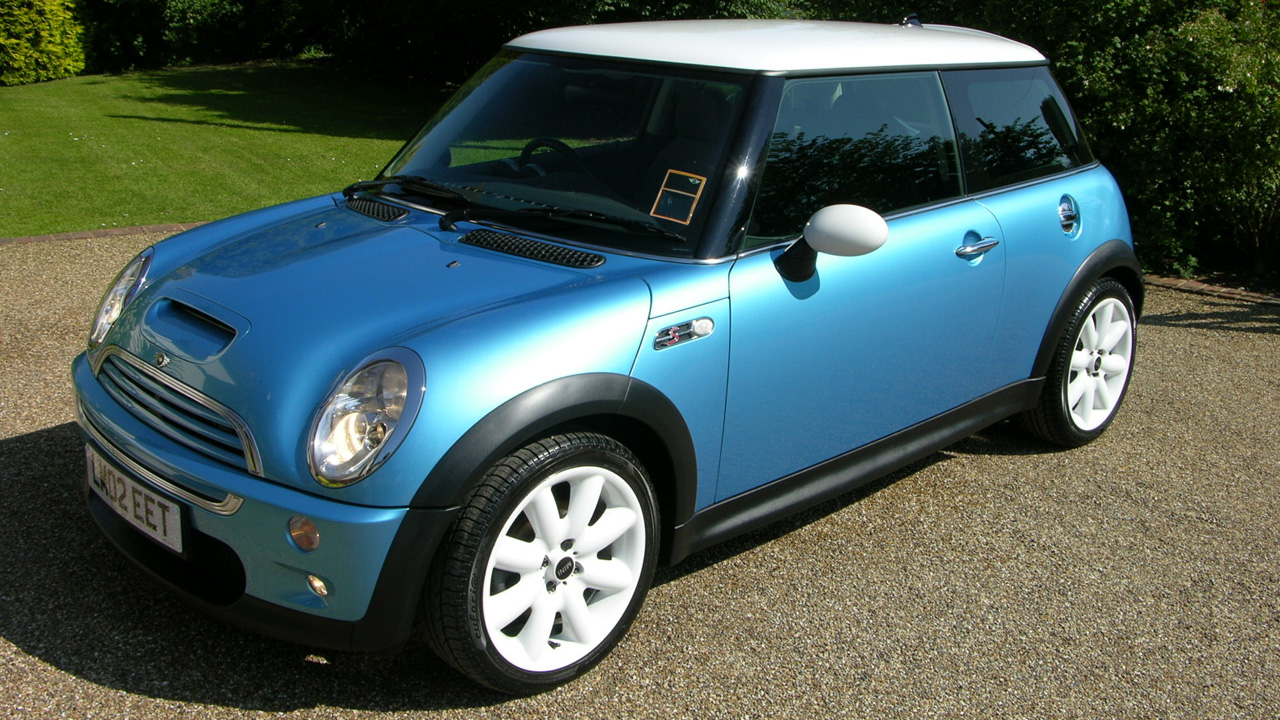 An R53 Mini Cooper S in bright blue, front 3/4 view