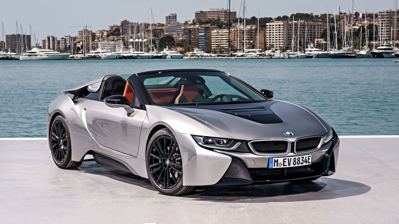 Silver 2020 BMW i8 Roadster Parked With Roof Down By Ocean Front 3/4 View