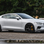 The Polestar 1 in white with black wheels, front 3/4 view