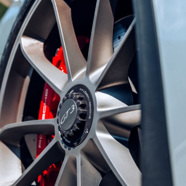 Porsche 911 GT3 showing the center lock wheel with red brake caliper