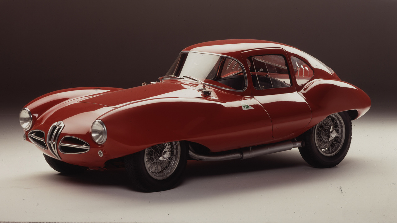 Red 1952 Alfa Romeo 1900 C52 Disco Volante Coupe Parked In Studio Front 3/4 View