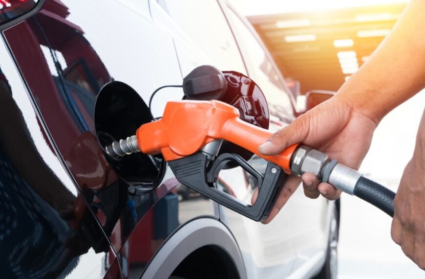 Refueling the car at a gas station fuel pump
