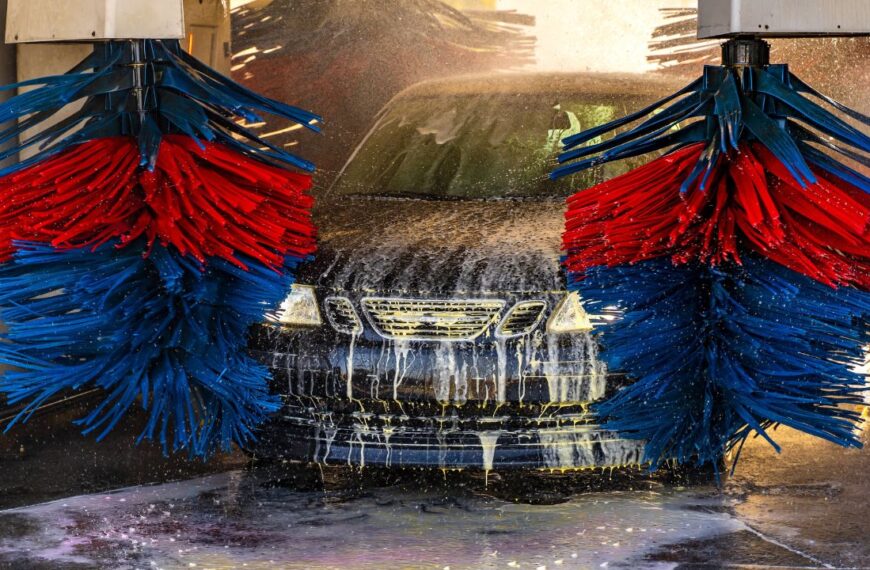 Car going through an automated car wash machine.