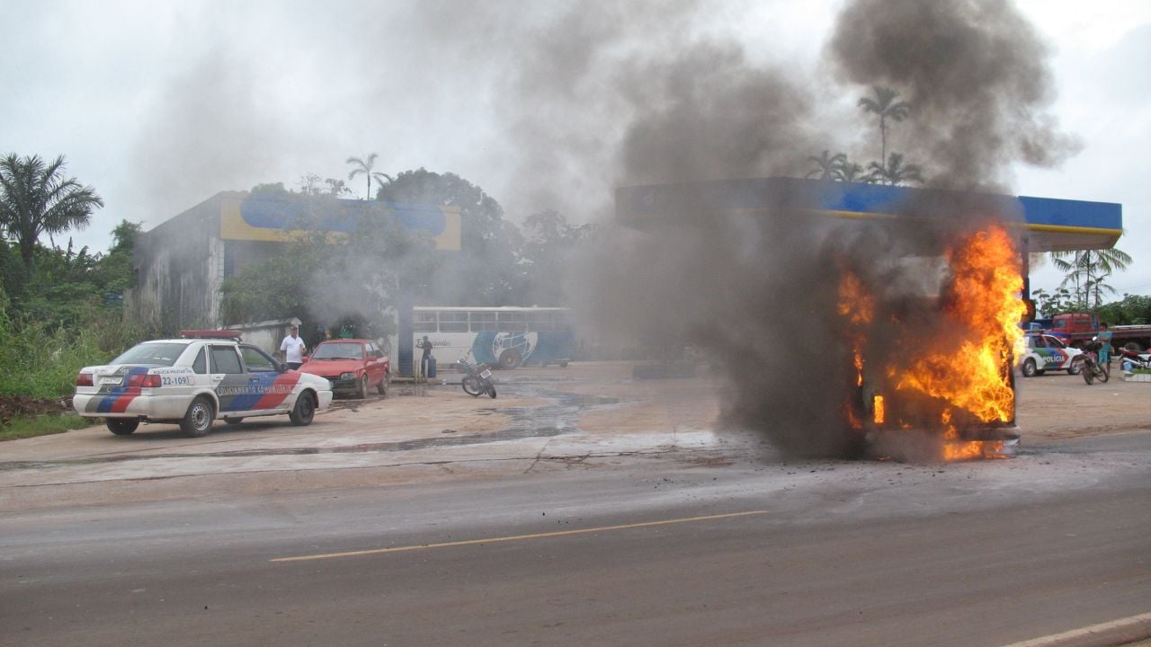 Danger of an explosion, car completely enveloped in flames near a petrol station, Iranduba. Amazon, Brazil