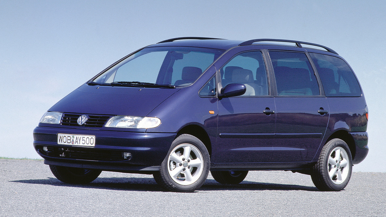 A first generation Volkswagen Sharan in dark blue, front 3/4 view
