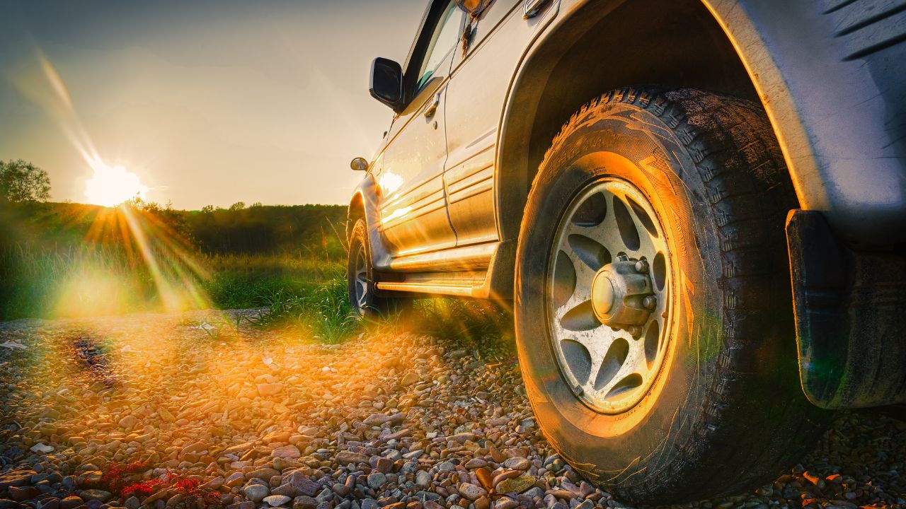 car driving on dirt road