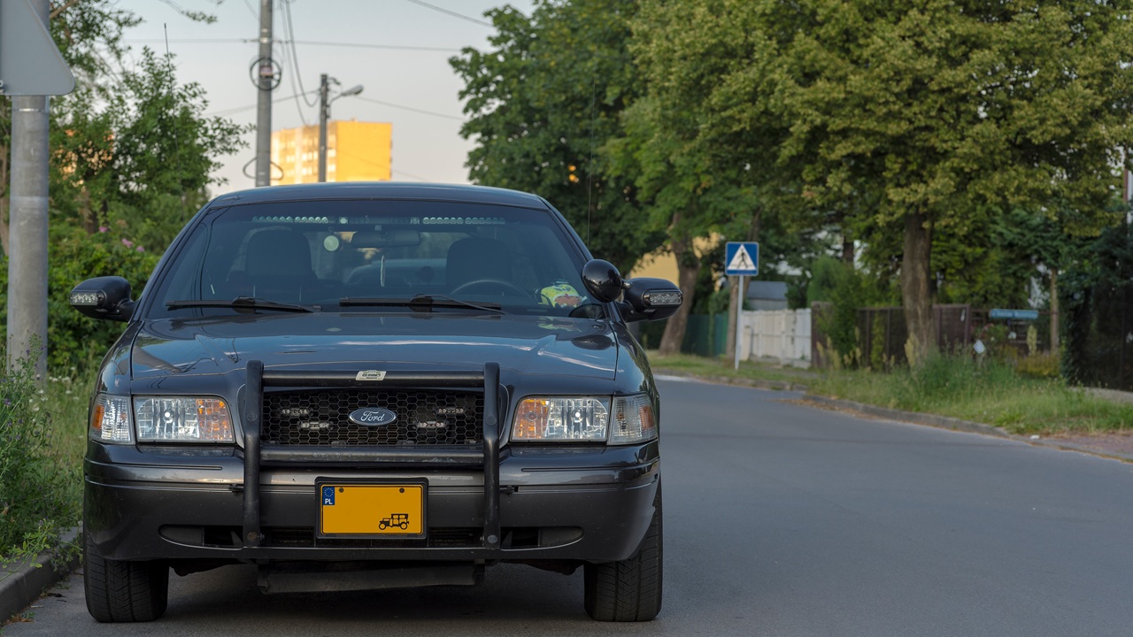 A bullbar over the front grille of a police vehicle