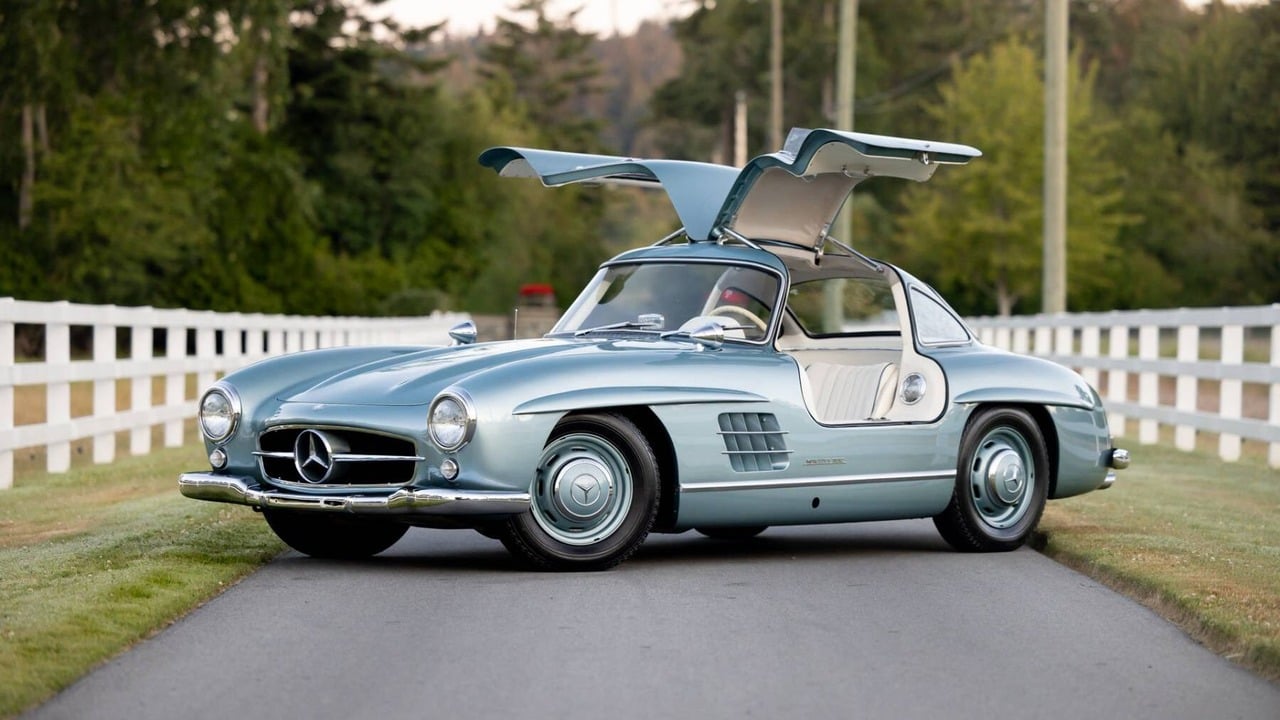 Light Blue 1956 Mercedes-Benz 300 SL Gullwing Parked With Doors Open Front 3/4 view