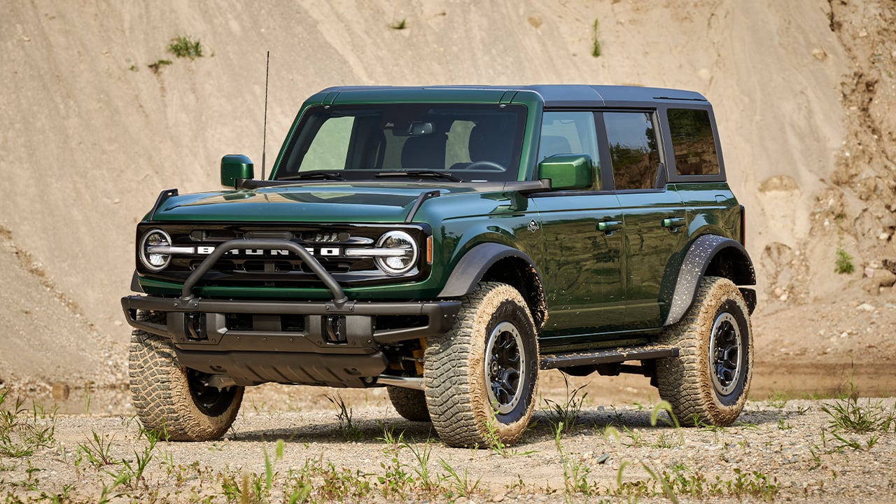 A dark green Ford Bronco Everglades, front 3/4 view