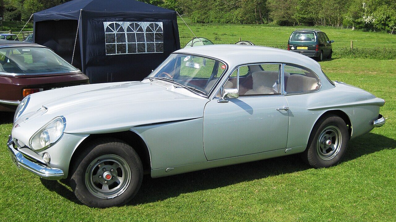 Jensen C-V8 MkII parked on grass.