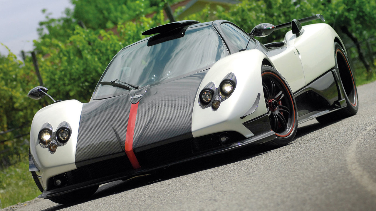A Pagani Zonda Cinque in white, front 3/4 view, tilted angle