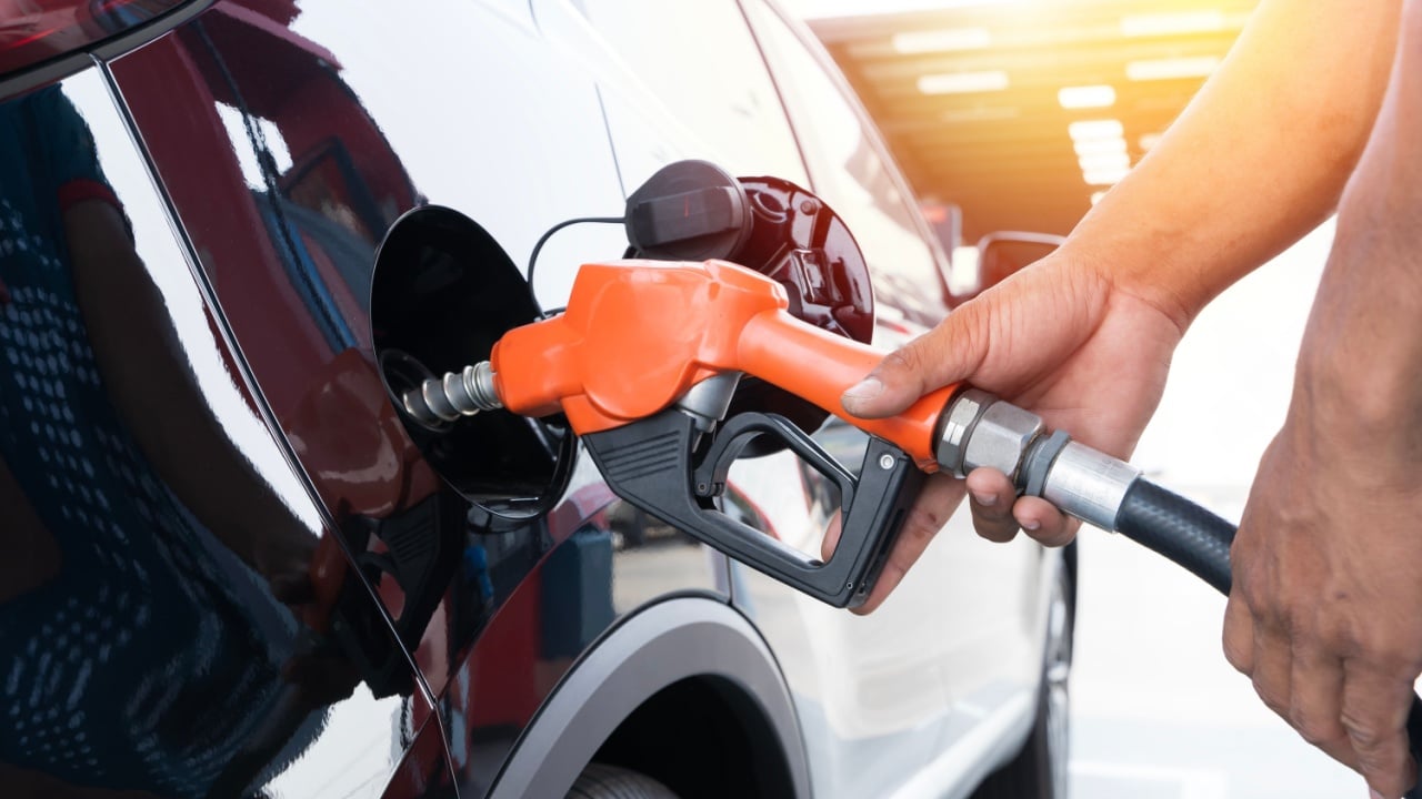 Refueling a car at a gas station