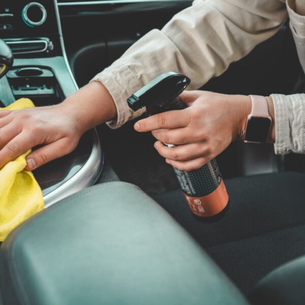 Spray down your cup holders with cleaner before using a drill brush to clean them
