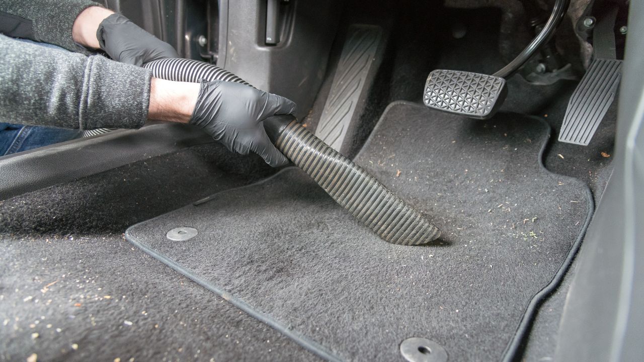 vacuuming car carpet