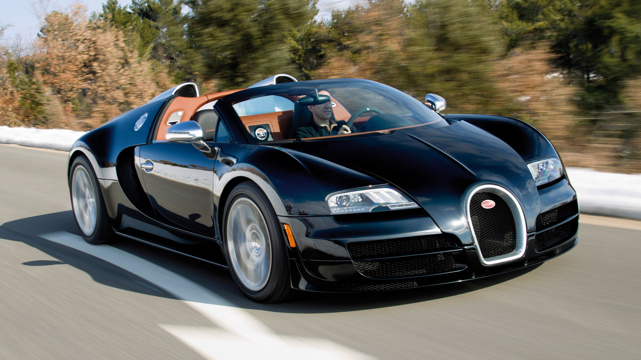 Black 2012 Bugatti Veyron 16.4 Grand Sport Vitesse Driving With Roof Down Front 3/4 View