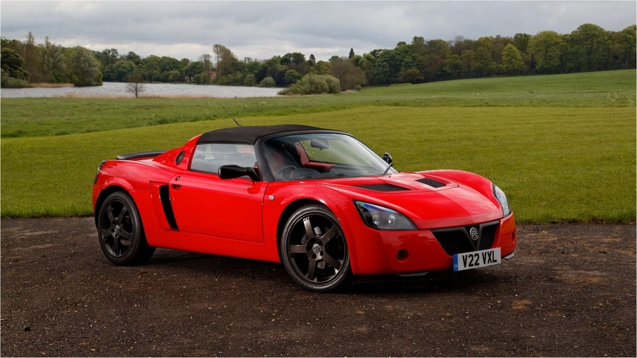 Red Vauxhall VX220 Parked Front 3/4 View