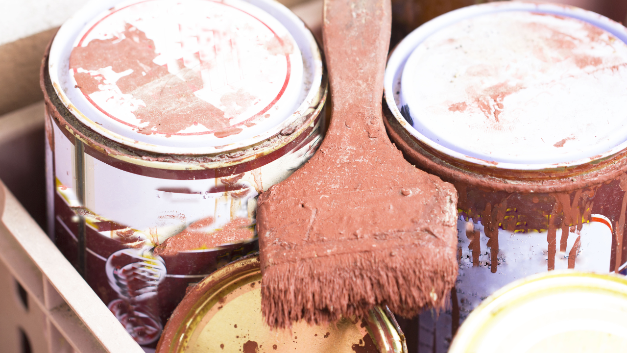 Old paintbrush and can