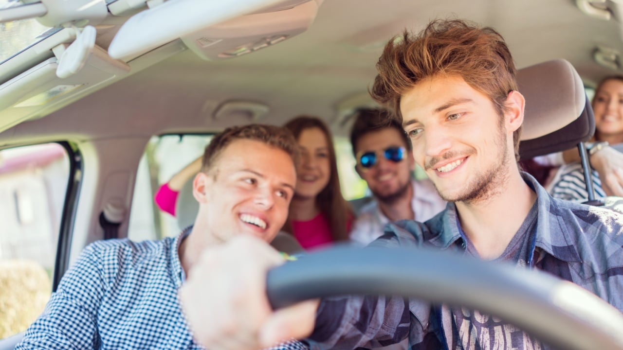 Teenagers in a car driving together