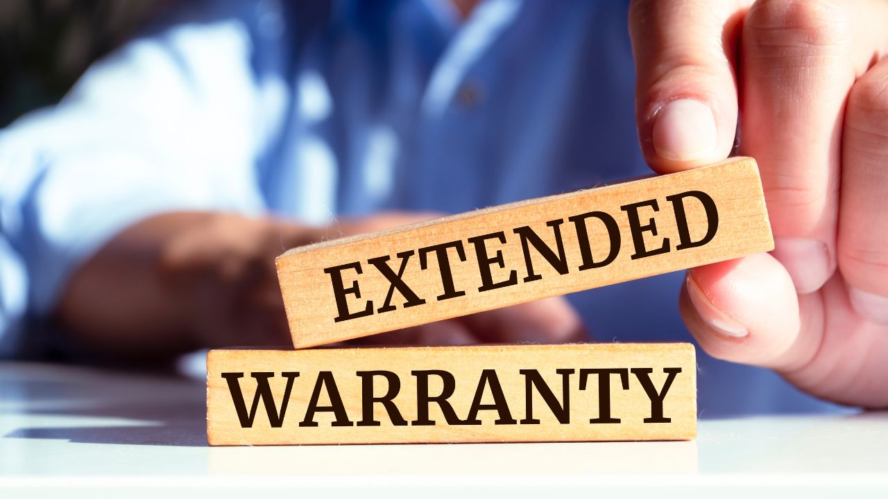 Wooden blocks with words 'Extended Warranty'.