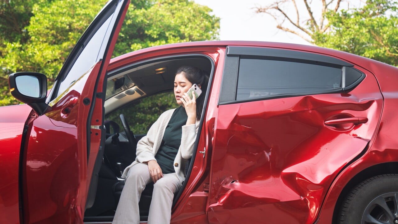 Car accident.Young Asian woman after car accident. Car accident.Young Asian woman after car accident.