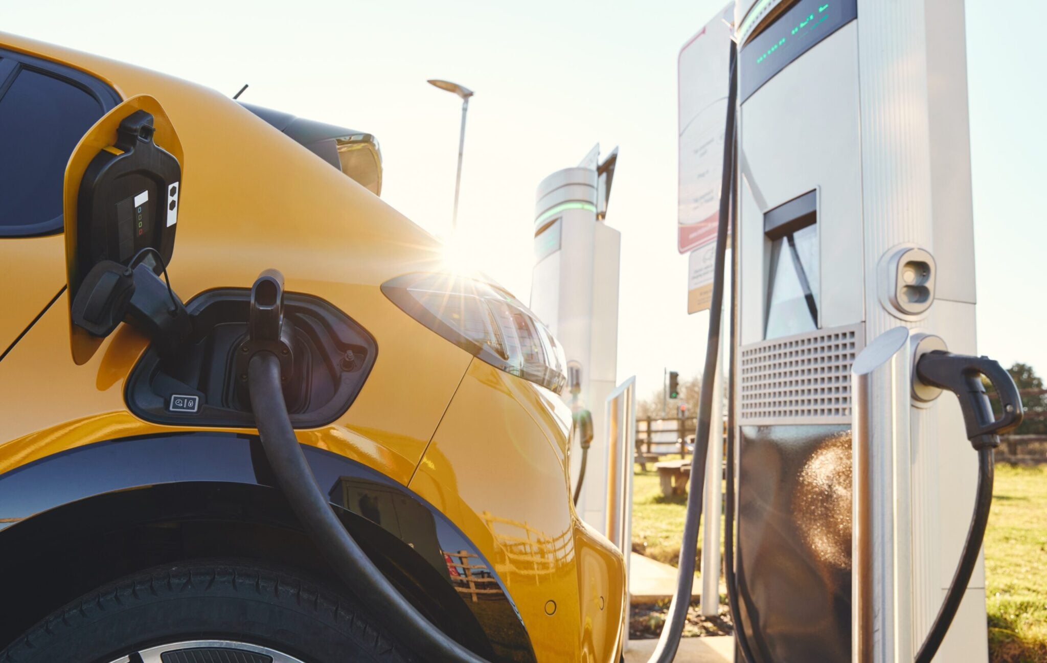 Plugged,In,Electric,Car,In,At,A,Ev,Charging,Station