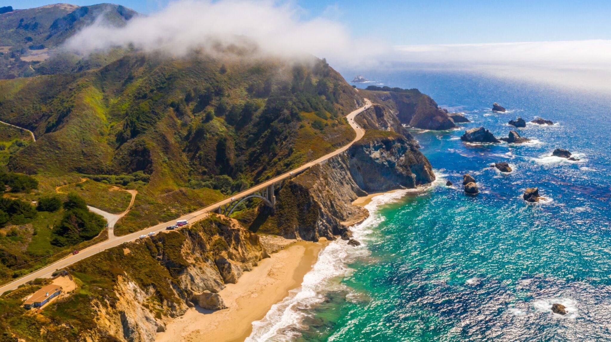 aerial view of the route 101 by the Californian Pacific Coast on the way from Los Angeles to San Francisco near Big Sur Bixby Bridge scaled