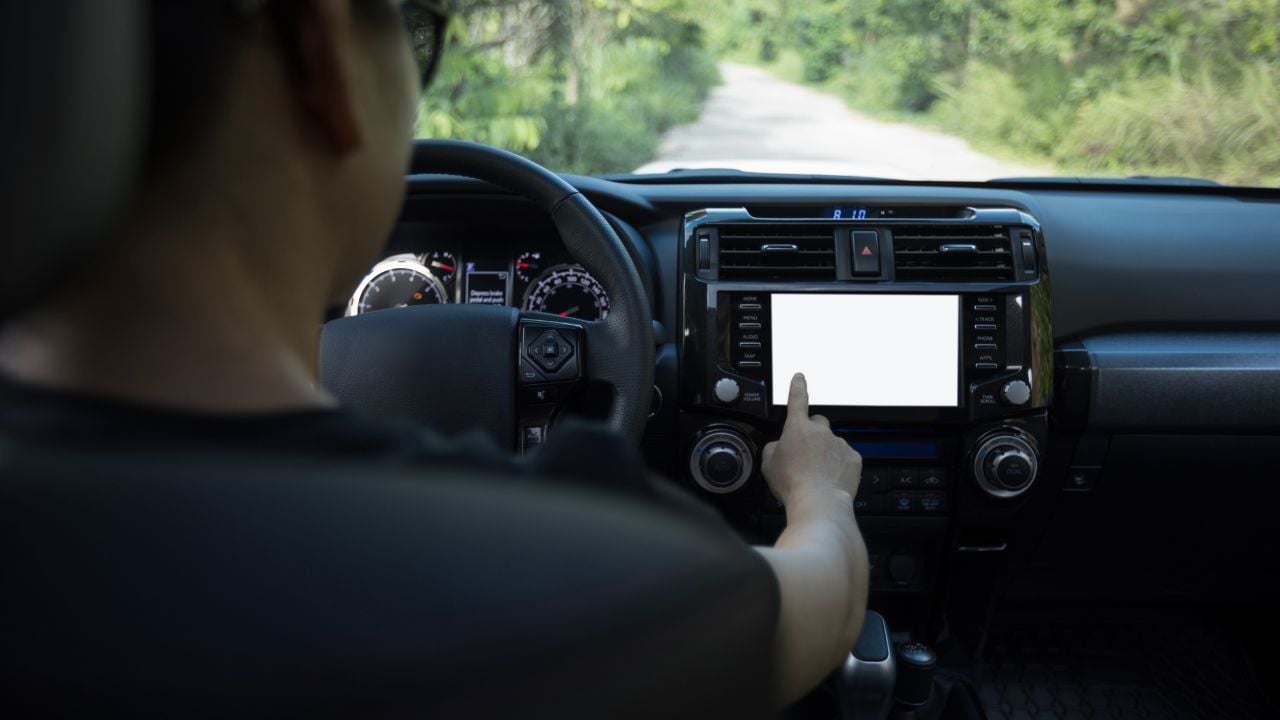 Driving off road car in the nature, touchscreen